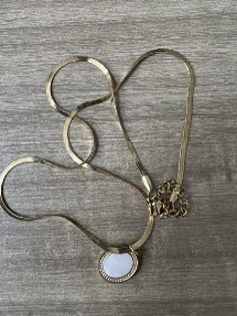 white round necklace