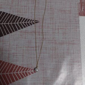 Single necklace with pearl and zirconia