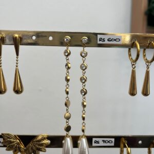 Dangling pearl earrings